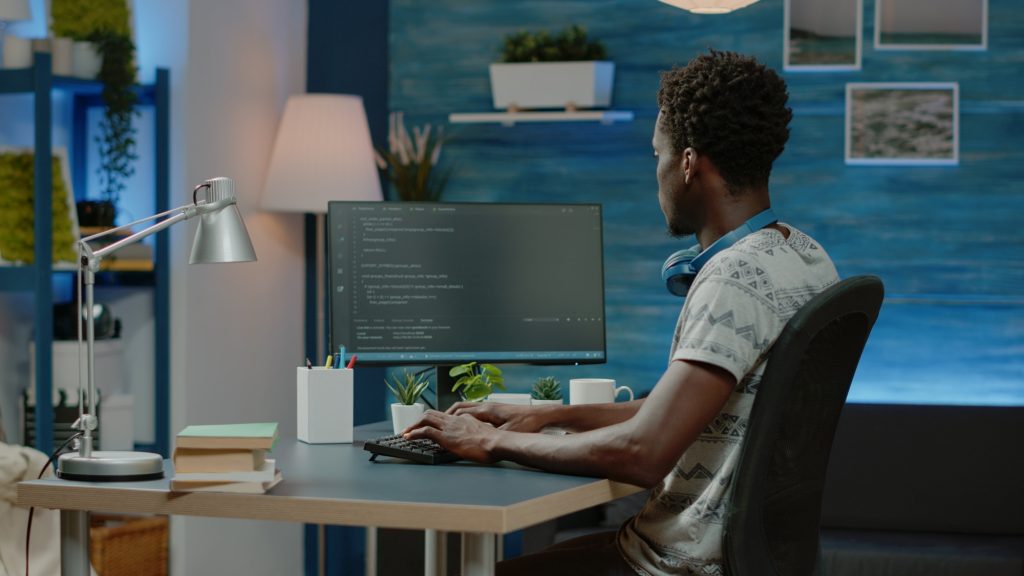 Programmer using binary code for website interface development